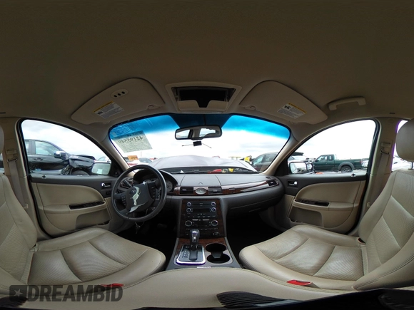 2009 Ford Taurus Limited z VIN 1FAHP25W59G115291, wystawiony jako IAAI lot #42195549 z przebiegiem 58 983 mil mil oraz . Historia ofert i sprzedaży dostępna na DreamBid. Obrazek 19.
