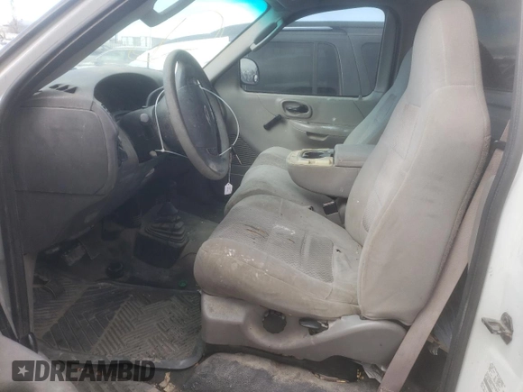 2003 Ford F-150 XL with VIN 2FTRF18W53CA04398, listed as a Copart auction lot 42981485 with 244,706 mi miles and Salvage title. Bid and sale history available at DreamBid. Image 7.