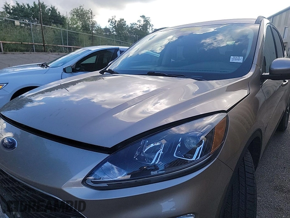 2021 Ford Escape SEL Hybrid with VIN 1FMCU0CZXMUB25464, listed as a IAAI auction lot 42616757 with 96,059 mi miles and . Bid and sale history available at DreamBid. Image 17.