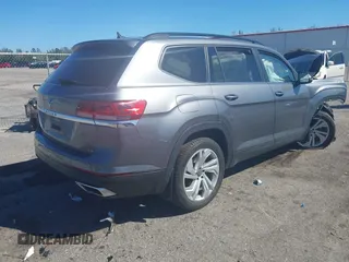2021 Volkswagen Atlas SE z VIN 1V2WR2CA3MC602149, wystawiony jako IAAI lot #41845288 z przebiegiem 59 941 mil mil oraz . Historia ofert i sprzedaży dostępna na DreamBid. Obrazek 4.