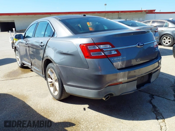 2013 Ford Taurus SEL with VIN 1FAHP2E81DG229444, listed as a IAAI auction lot 42095216 with 211,812 mi miles and . Bid and sale history available at carsss.com. Image 3.