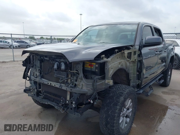 2017 Toyota Tacoma SR5 with VIN 5TFAZ5CN4HX047095, listed as a IAAI auction lot 41951364 with 127,706 mi miles and . Bid and sale history available at DreamBid. Image 6.
