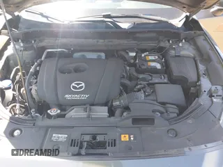 2017 Mazda CX-5 Grand Touring with VIN JM3KFADL6H0217850, listed as a IAAI auction lot 42033404 with 74,198 mi miles and . Bid and sale history available at carsss.com. Image 10.