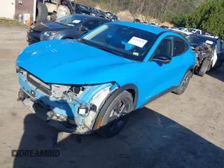 2023 Ford Mustang Mach-E Select z VIN 3FMTK1SS3PMA28535, wystawiony jako IAAI lot #42127075 z przebiegiem 28 092 mil mil oraz . Historia ofert i sprzedaży dostępna na DreamBid. Obrazek 2.