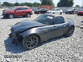 2020 Mazda MX-5 Miata Grand Touring z VIN JM1NDAD77L0414873, wystawiony jako Copart lot #54767785 z przebiegiem 47 579 mil mil oraz Szkody całkowita. Historia ofert i sprzedaży dostępna na DreamBid. Obrazek 1.
