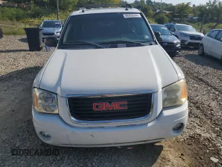 2005 GMC Envoy SLT with VIN 1GKDT13S552329269, listed as a Copart auction lot 69209244 with 154,595 mi miles and Salvage Title. Bid and sale history available at carsss.com. Image 5.