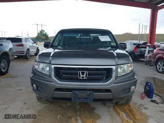 2009 Honda Ridgeline RT with VIN 2HJYK16279H501015, listed as a IAAI auction lot 41996301 with 124,716 mi miles. Bid and sale history available at carsss.com. Image 12.