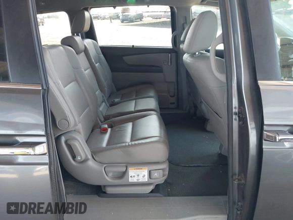 2012 Honda Odyssey EX-L with VIN 5FNRL5H6XCB103498, listed as a IAAI auction lot 42065658 with 104,933 mi miles and . Bid and sale history available at carsss.com. Image 8.