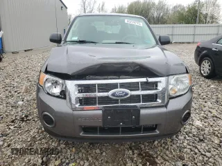 2009 Ford Escape XLS z VIN 1FMCU02799KC31553, wystawiony jako Copart lot #55219775 z przebiegiem 109 154 mil mil oraz Szkoda całkowita • Salvage title. Historia ofert i sprzedaży dostępna na DreamBid. Obrazek 5.