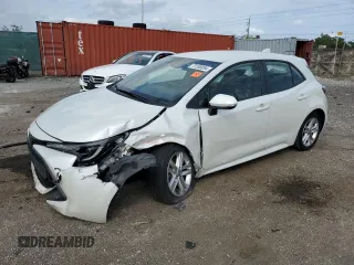 2020 Toyota Corolla Hatchback SE with VIN JTND4RBE2L3088079, listed as a Copart auction lot 75100054 with 27,730 mi miles and Salvage Title. Bid and sale history available at carsss.com. Image 1.