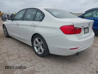 2014 BMW 3 Series 320i xDrive with VIN WBA3C3C52EP661389, listed as a IAAI auction lot 42160042 with 131,997 mi miles and . Bid and sale history available at DreamBid. Image 3.
