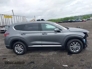 2019 Hyundai Santa Fe SEL z VIN 5NMS3CAD7KH035429, wystawiony jako IAAI lot #42323641 z przebiegiem 60 909 mil mil oraz . Historia ofert i sprzedaży dostępna na DreamBid. Obrazek 14.