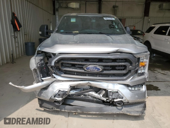 2021 Ford F-150 XL with VIN 1FTFW1E85MKE03933, listed as a Copart auction lot 60513185 with 82,793 mi miles and Salvage title. Bid and sale history available at DreamBid. Image 5.