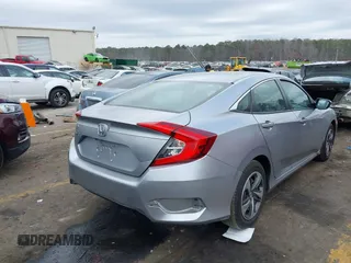 2021 Honda Civic Sedan LX with VIN 2HGFC2F64MH520374, listed as a IAAI auction lot 41722637 with 60,000 mi miles. Bid and sale history available at carsss.com. Image 4.