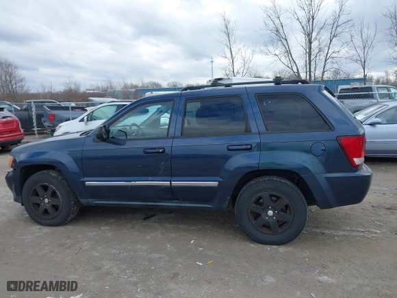2010 Jeep Grand Cherokee Laredo with VIN 1J4PR4GK5AC138498, listed as a IAAI auction lot 41870740 with 130,551 mi miles. Bid and sale history available at carsss.com. Image 14.
