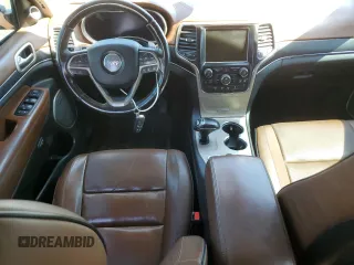 2015 Jeep Grand Cherokee Summit with VIN 1C4RJFJM3FC731831, listed as a Copart auction lot 66570534 with 230,193 mi miles and Clean title. Bid and sale history available at DreamBid. Image 8.