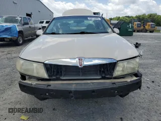 2001 Lincoln Continental z VIN 1LNHM97V91Y622267, wystawiony jako Copart lot #59915445 z przebiegiem 77 070 mil mil oraz Szkoda całkowita • Salvage title. Historia ofert i sprzedaży dostępna na DreamBid. Obrazek 5.