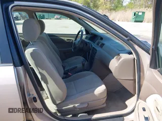 2001 Toyota Camry CE with VIN 4T1BG22K11U114688, listed as a IAAI auction lot 42065715 with 150,181 mi miles. Bid and sale history available at carsss.com. Image 5.
