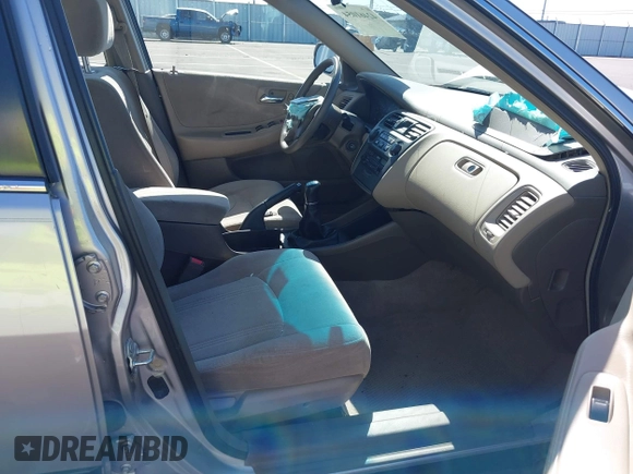 1999 Honda Accord LX with VIN JHMCG5545XC028563, listed as a IAAI auction lot 42461054 with 212,100 mi miles and . Bid and sale history available at DreamBid. Image 5.