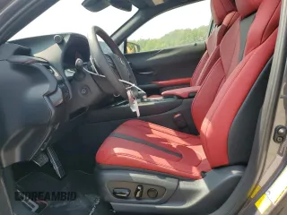 2024 Lexus UX with VIN JTHUCJDH3S2001180, listed as a Copart auction lot 67561984 with 9,968 mi miles and Salvage Title. Bid and sale history available at carsss.com. Image 7.
