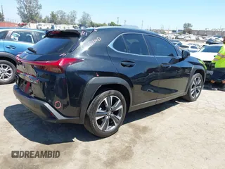2022 Lexus UX 200 with VIN JTHX3JBH8N2047074, listed as a IAAI auction lot 42665051 with 27,249 mi miles and . Bid and sale history available at DreamBid. Image 4.