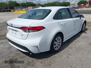2022 Toyota Corolla LE with VIN 5YFEPMAE0NP358957, listed as a IAAI auction lot 42167553 with 48,339 mi miles and . Bid and sale history available at carsss.com. Image 4.
