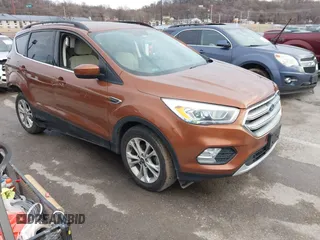 2017 Ford Escape SE with VIN 1FMCU0GD5HUE08097, listed as a IAAI auction lot 41499800 with 70,911 mi miles. Bid and sale history available at carsss.com. Image 1.