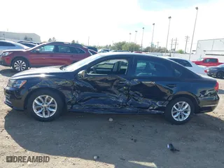 2018 Volkswagen Passat 2.0T S with VIN 1VWAA7A35JC007347, listed as a IAAI auction lot 41809749 with 39,123 mi miles. Bid and sale history available at carsss.com. Image 6.