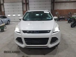 2016 Ford Escape Titanium with VIN 1FMCU9J95GUB02377, listed as a IAAI auction lot 41869557 with 88,441 mi miles. Bid and sale history available at carsss.com. Image 12.