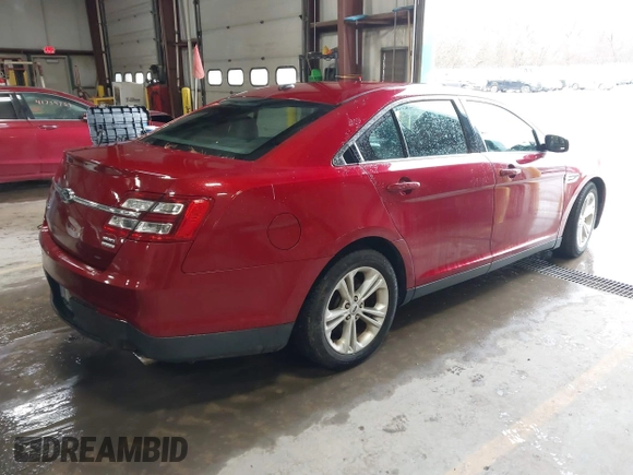 2013 Ford Taurus SEL with VIN 1FAHP2E99DG180535, listed as a IAAI auction lot 41741619 with 193,665 mi miles and . Bid and sale history available at carsss.com. Image 4.