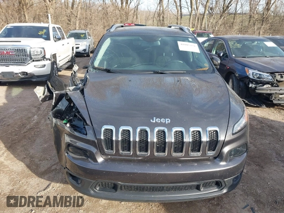 2016 Jeep Cherokee Latitude with VIN 1C4PJMCS7GW246423, listed as a IAAI auction lot 41805421 with 60,880 mi miles and . Bid and sale history available at carsss.com. Image 12.