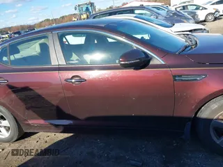2015 Kia Optima LX with VIN 5XXGM4A79FG384762, listed as a IAAI auction lot 40919391 with 183,379 mi miles. Bid and sale history available at carsss.com. Image 13.