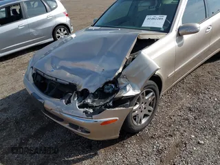 2005 Mercedes-Benz E-Class 3.2L with VIN WDBUF65J05A706096, listed as a IAAI auction lot 41482289 with 110,531 mi miles. Bid and sale history available at carsss.com. Image 6.