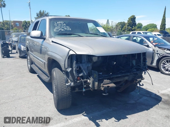 2002 GMC Yukon SLT with VIN 1GKEC13T62R202059, listed as a IAAI auction lot 42023547 with 1 mi miles. Bid and sale history available at carsss.com. Image 1.