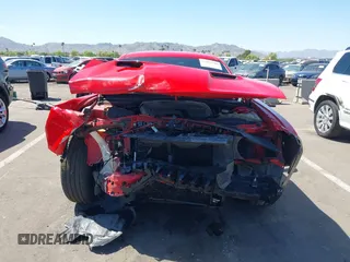 2018 Dodge Challenger SXT z VIN 2C3CDZAG6JH294667, wystawiony jako IAAI lot #42062200 z przebiegiem 84 911 mil mil oraz . Historia ofert i sprzedaży dostępna na DreamBid. Obrazek 13.