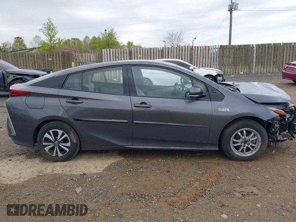 2018 Toyota Prius Plus with VIN JTDKARFP6J3078362, listed as a IAAI auction lot 42021835 with 61,170 mi miles and . Bid and sale history available at DreamBid. Image 13.
