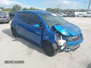 2012 Toyota Yaris L with VIN JTDKTUD38CD520973, listed as a IAAI auction lot 40859001 with 89,683 mi miles. Bid and sale history available at carsss.com. Image 1.