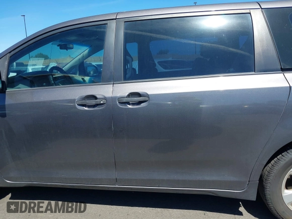 2012 Toyota Sienna with VIN 5TDZK3DC9CS261944, listed as a IAAI auction lot 41885359 with 184,918 mi miles. Bid and sale history available at carsss.com. Image 15.