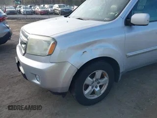 2009 Honda Pilot EX-L with VIN 5FNYF48559B034121, listed as a IAAI auction lot 41928138 with 193,969 mi miles. Bid and sale history available at carsss.com. Image 6.