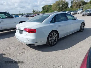 2015 Audi A8 L 4.0T with VIN WAU32AFD4FN002639, listed as a IAAI auction lot 41703951 with 103,722 mi miles. Bid and sale history available at carsss.com. Image 4.