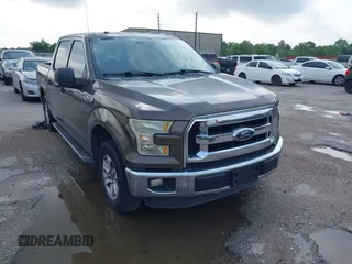 2015 Ford F-150 XLT with VIN 1FTEW1C81FKD15088, listed as a IAAI auction lot 42044616 with 159,248 mi miles and . Bid and sale history available at carsss.com. Image 1.