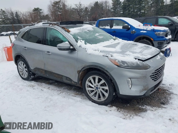 2021 Ford Escape Titanium Hybrid with VIN 1FMCU9DZXMUA01732, listed as a IAAI auction lot 41191436 with 41,116 mi miles and . Bid and sale history available at DreamBid. Image 1.