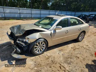 2010 Hyundai Azera Limited with VIN KMHFC4DF7AA450839, listed as a Copart auction lot 62987885 with 160,410 mi miles and Salvage title. Bid and sale history available at DreamBid. Image 1.