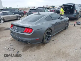 2021 Ford Mustang EcoBoost with VIN 1FA6P8TH1M5152941, listed as a IAAI auction lot 42110646 with 26,673 mi miles and . Bid and sale history available at DreamBid. Image 4.