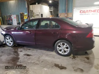 2012 Ford Fusion SE with VIN 3FAHP0HA0CR377773, listed as a Copart auction lot 57278885 with 133,700 mi miles and Salvage title. Bid and sale history available at DreamBid. Image 2.