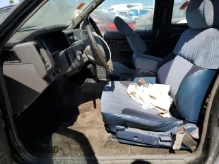 1989 Nissan Hardbody z VIN 1N6ND16S2KC377484, wystawiony jako Copart lot #65412324 z przebiegiem 31 573 mil mil oraz Szkody całkowita. Historia ofert i sprzedaży dostępna na DreamBid. Obrazek 7.