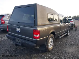2011 Ford Ranger XLT with VIN 1FTLR4FE6BPA39117, listed as a IAAI auction lot 41388849 with 215,294 mi miles. Bid and sale history available at carsss.com. Image 4.