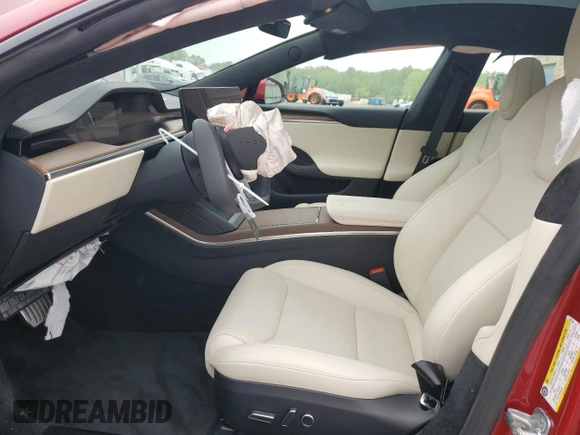 2024 Tesla Model S with VIN 5YJSA1E54RF542748, listed as a Copart auction lot 55210615 with Not provided miles and Salvage title. Bid and sale history available at DreamBid. Image 7.