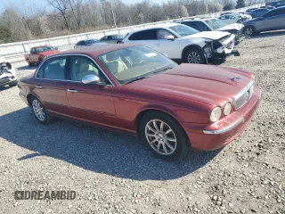 2005 Jaguar XJ Vanden Plas z VIN SAJWA82C75SG33074, wystawiony jako Copart lot #48725755 z przebiegiem 129 817 mil mil oraz Czysty tytuł • Clean title. Historia ofert i sprzedaży dostępna na DreamBid. Obrazek 4.