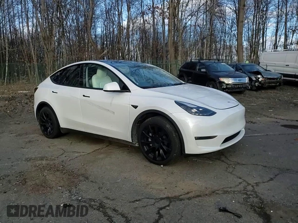 2023 Tesla Model Y Long Range with VIN 7SAYGAEE1PF967353, listed as a Copart auction lot 88700135 with 16,249 mi miles and Salvage Title. Bid and sale history available at DreamBid. Image 11.